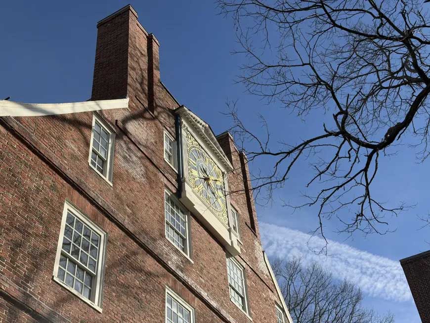 Brick building against a blue sky.