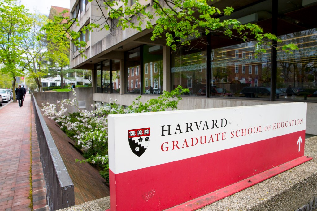 A photo of a sign that says Harvard Graduate School of Education