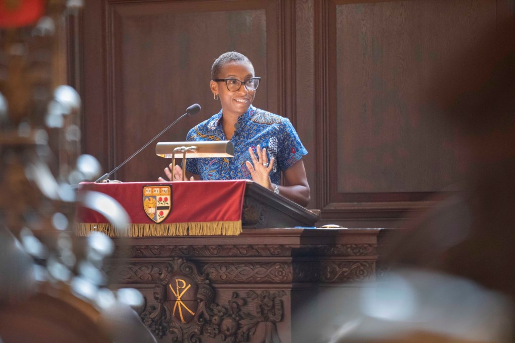 Claudine Gay at a podium