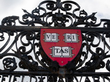 Harvard Vertias shield on gate