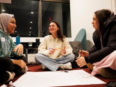Three students talking