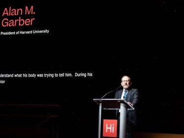 Alan Garber talking at a podium