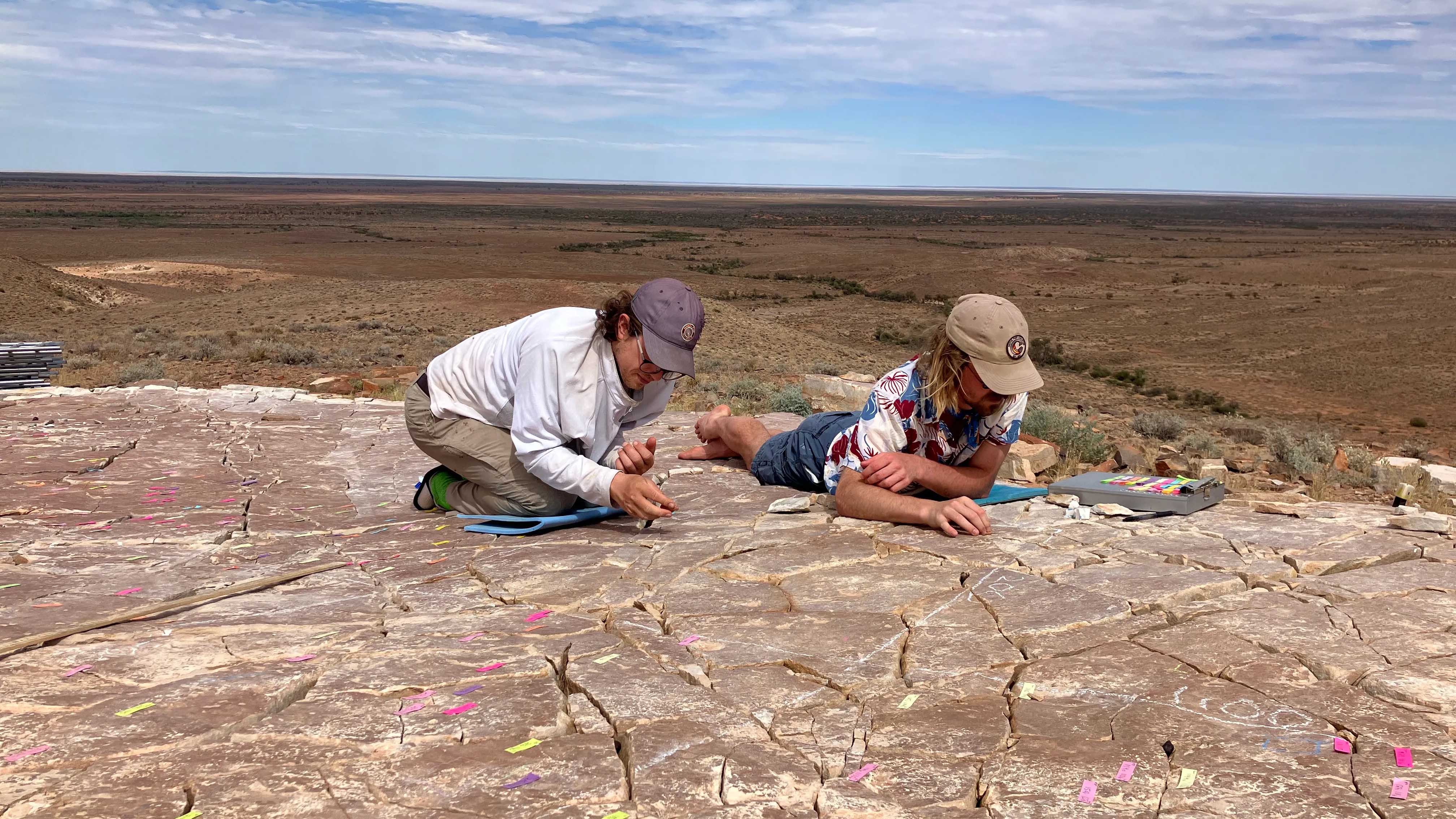 two people on an archeological dig